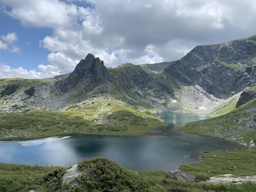 calm water near mountain