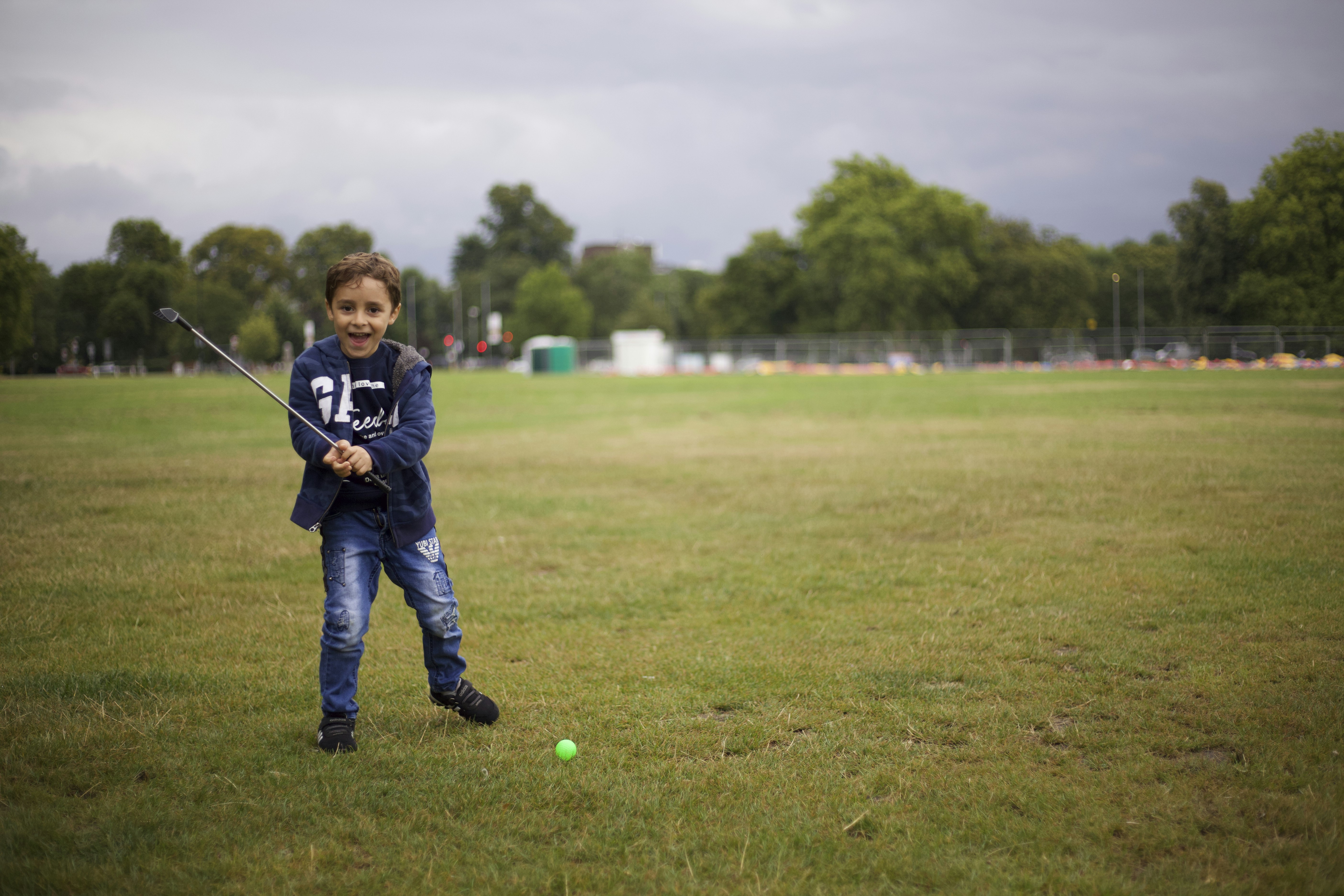 boy playing golf