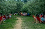 A serene outdoor setting with people engaged in discussion.