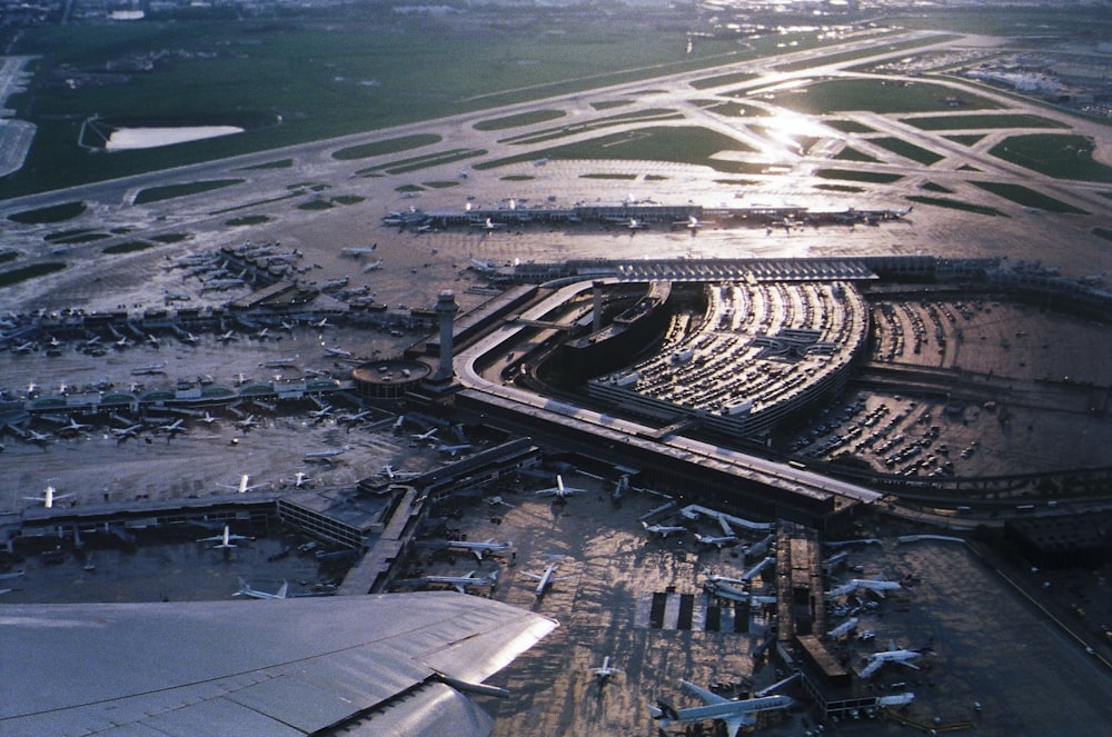 aerial photo of planes parked on field during daytime