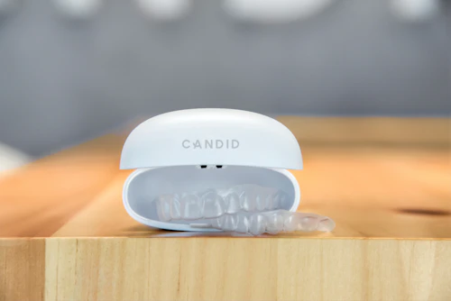 Clear aligner case on table showing orthodontic trays used by Orlando providers