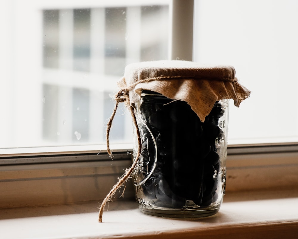 jar of grapes by the window