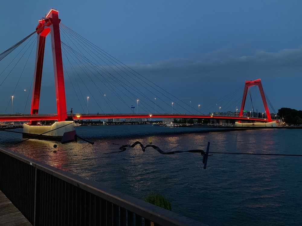 red concrete bridge at night time view