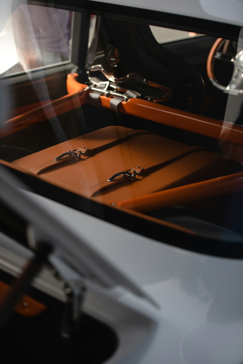 the interior of a car with leather seats