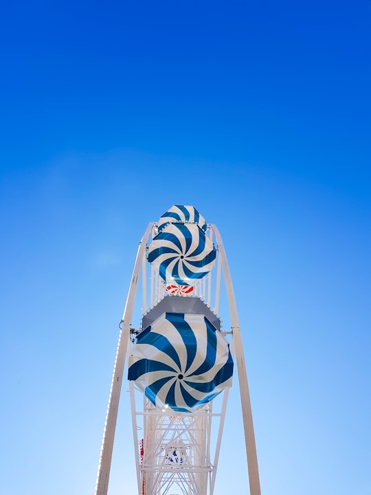 low angle photo of blue and white ferries wheel in Tours France