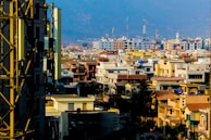 City skyline of Louisville with highlighted affordable housing projects.
