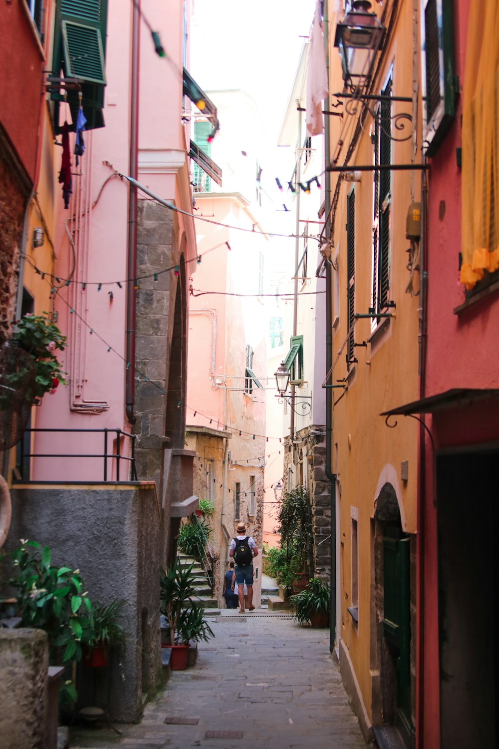 unknown person standing on alleyway