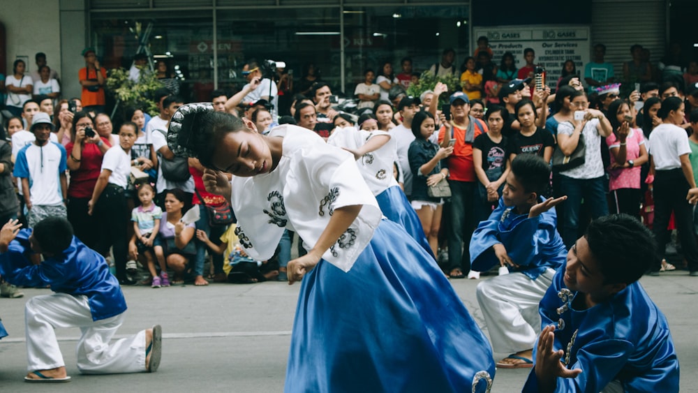 people dancing on street