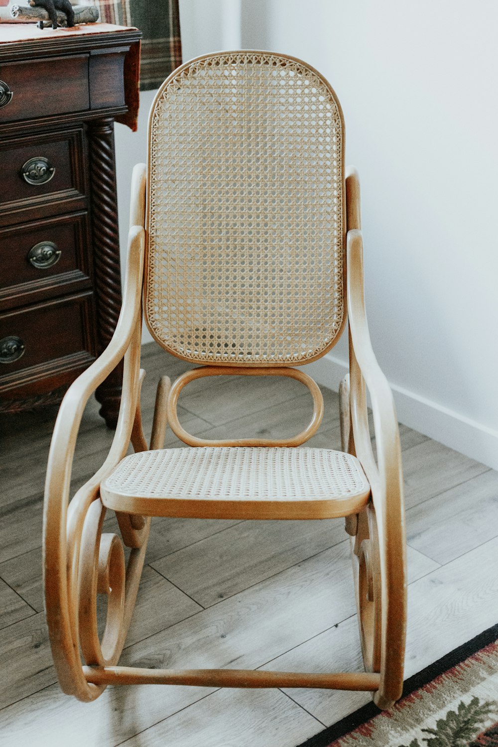 brown wooden rocking armchair