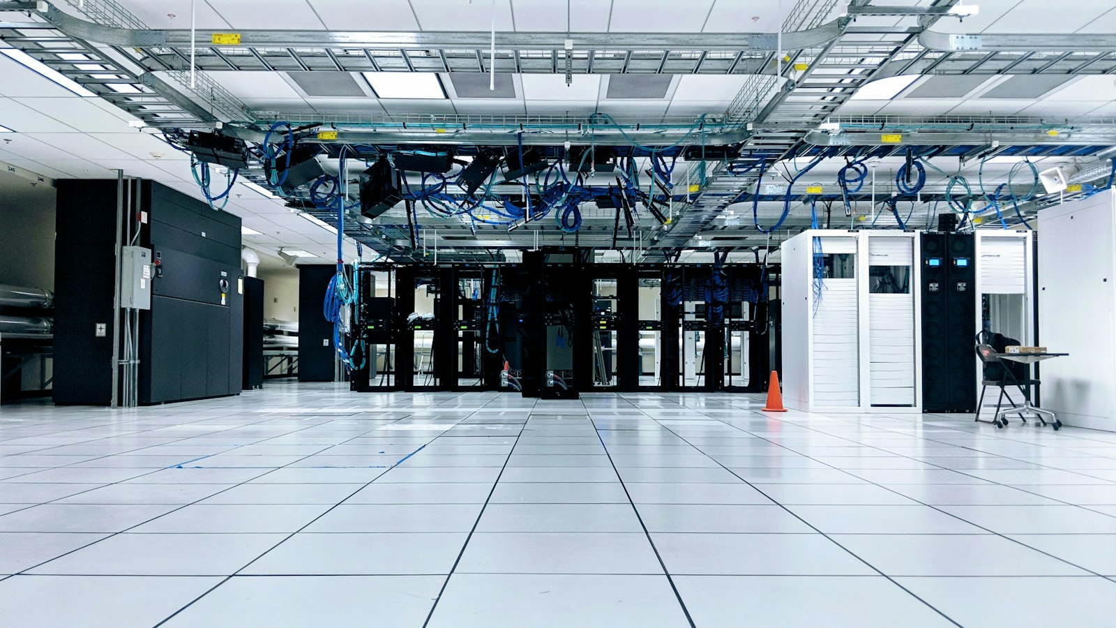 Rows of server cabinets in a data centre
