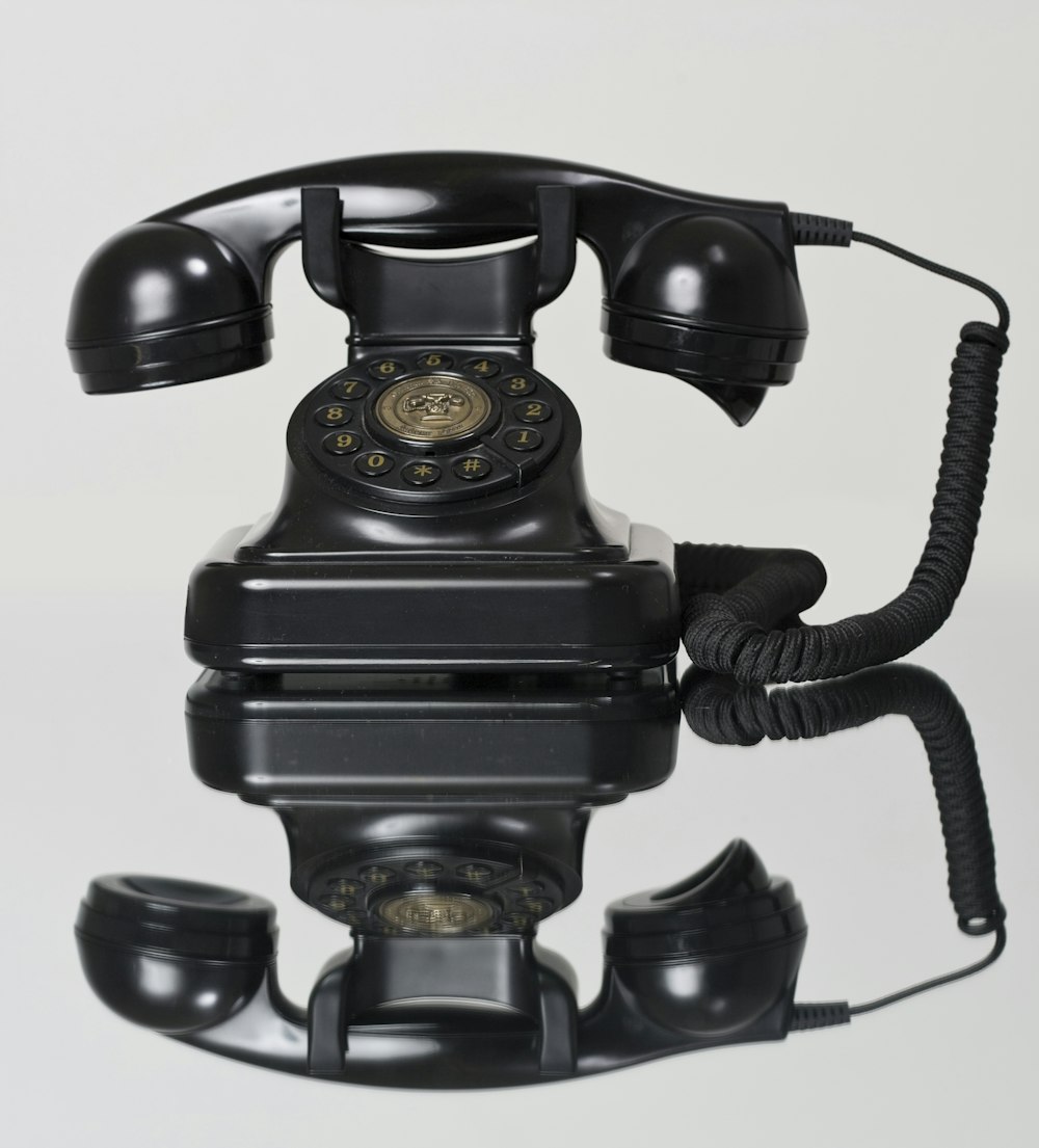 black rotary telephone