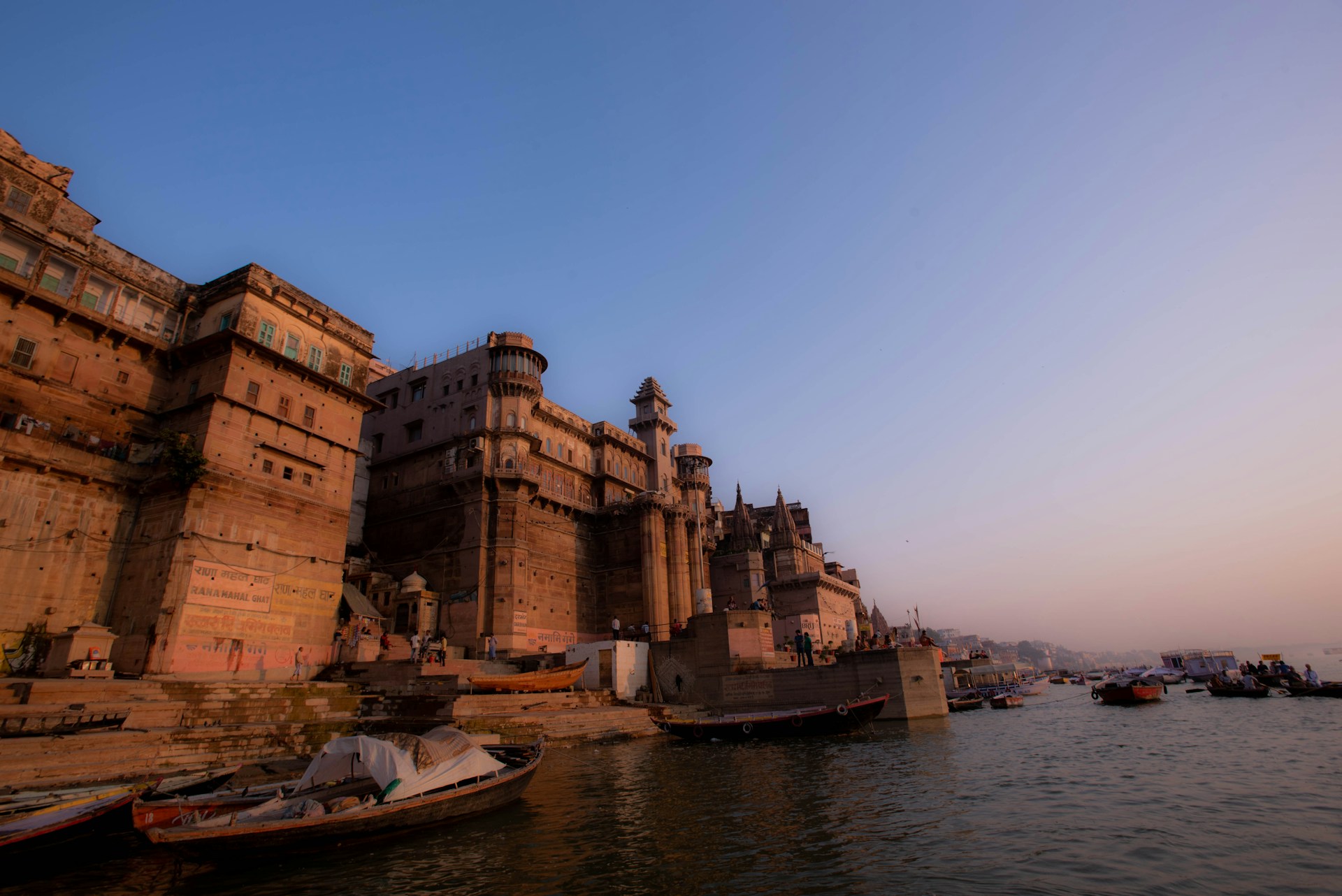 woman wearing yellow long-sleeved dress under white clouds and blue sky during daytime