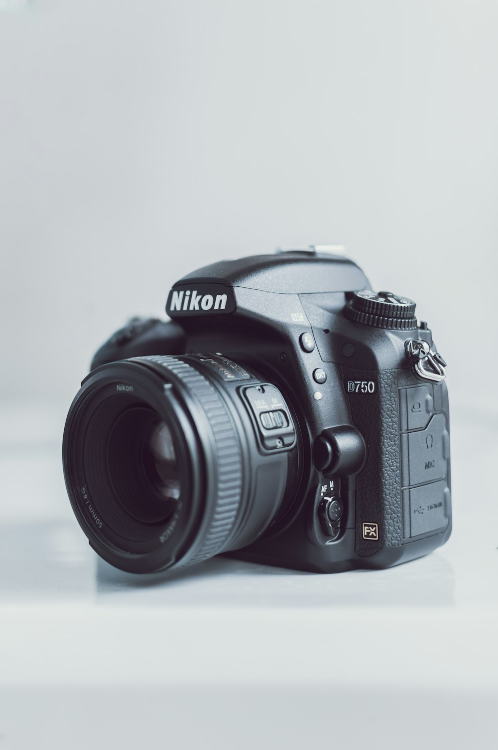 black Nikon DSLR camera