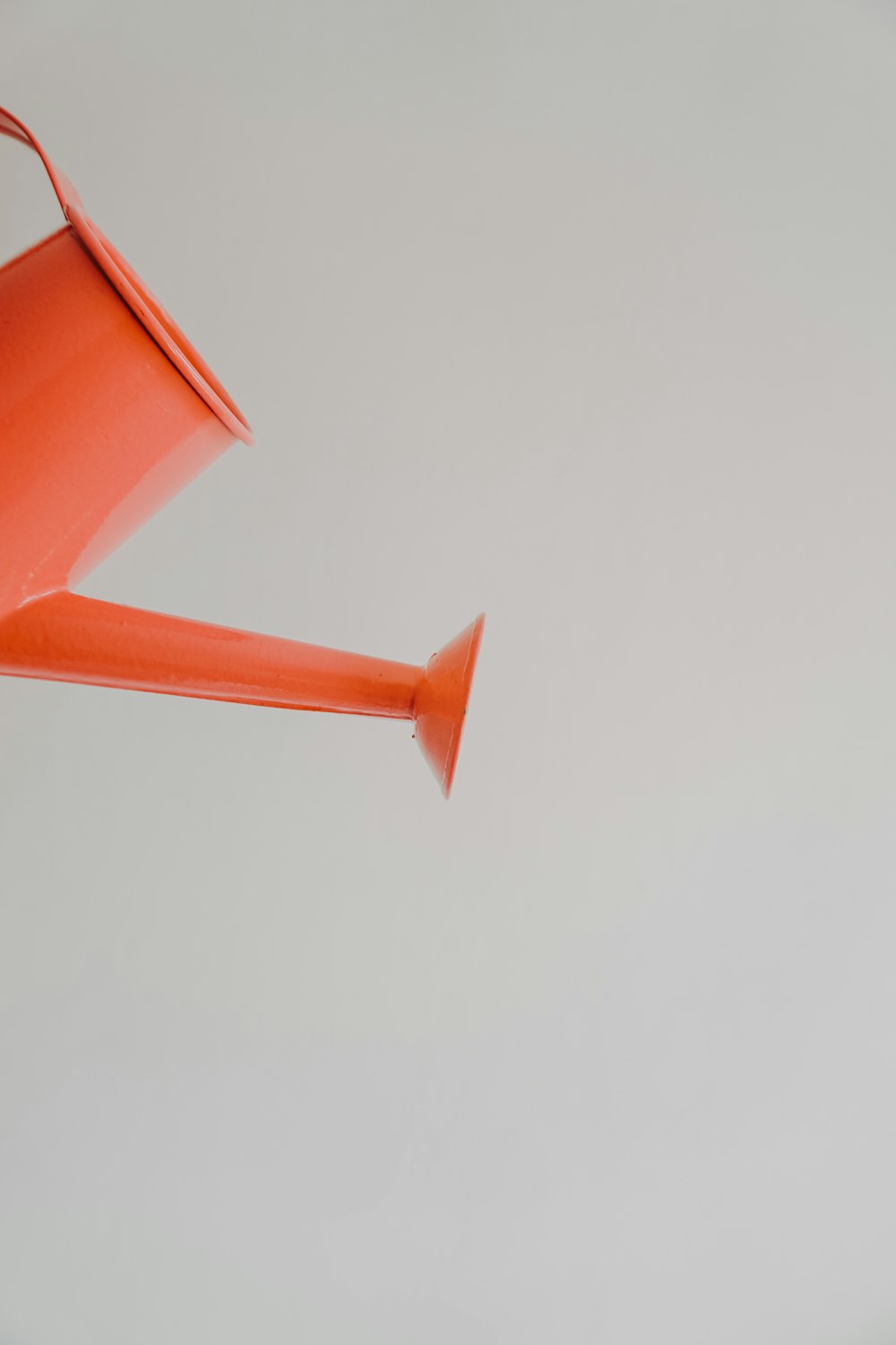 red watering can