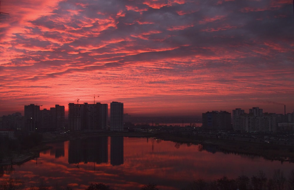 cityscape under red sky