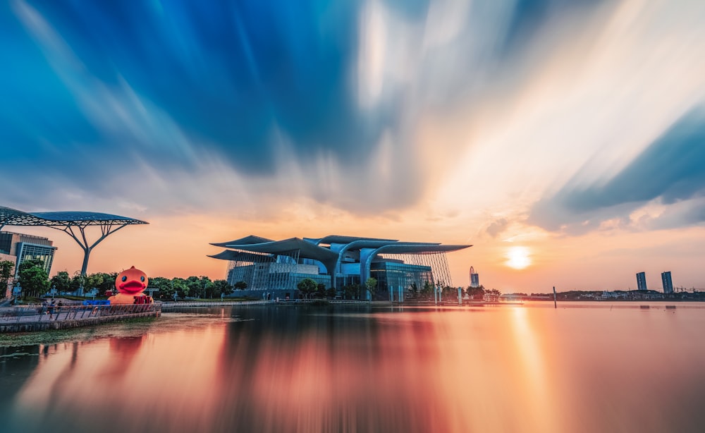 body of water during sunrise