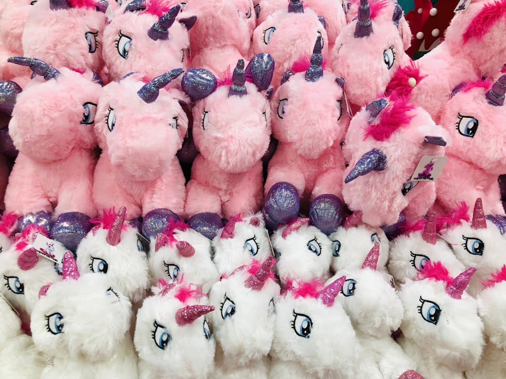 pink and white unicorn plush toys