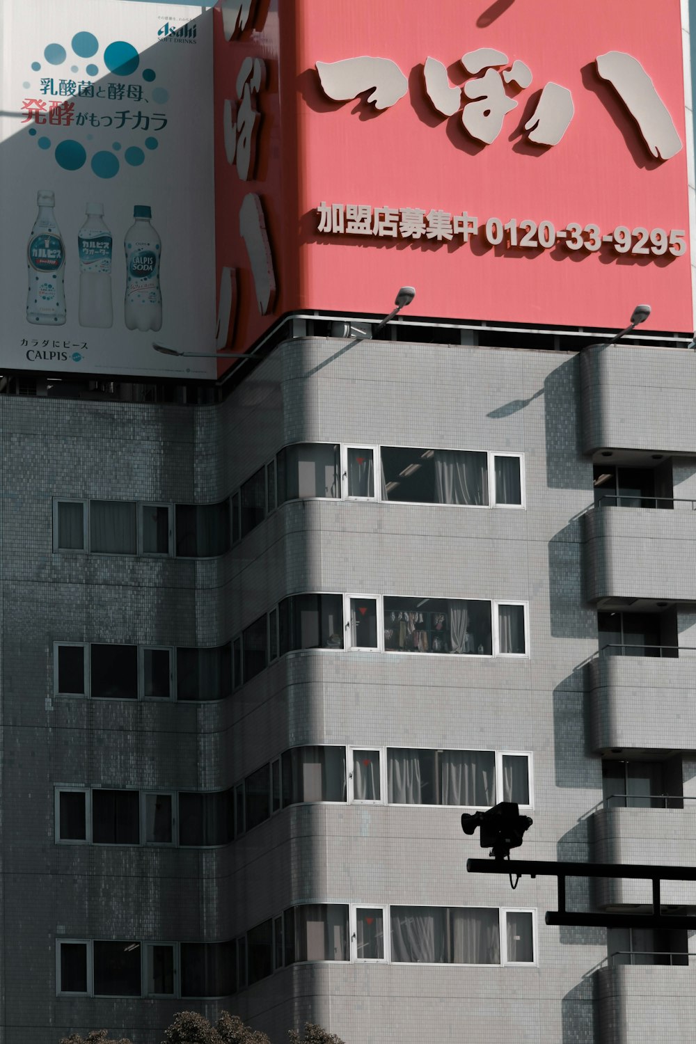 architectural photography of gray and red building