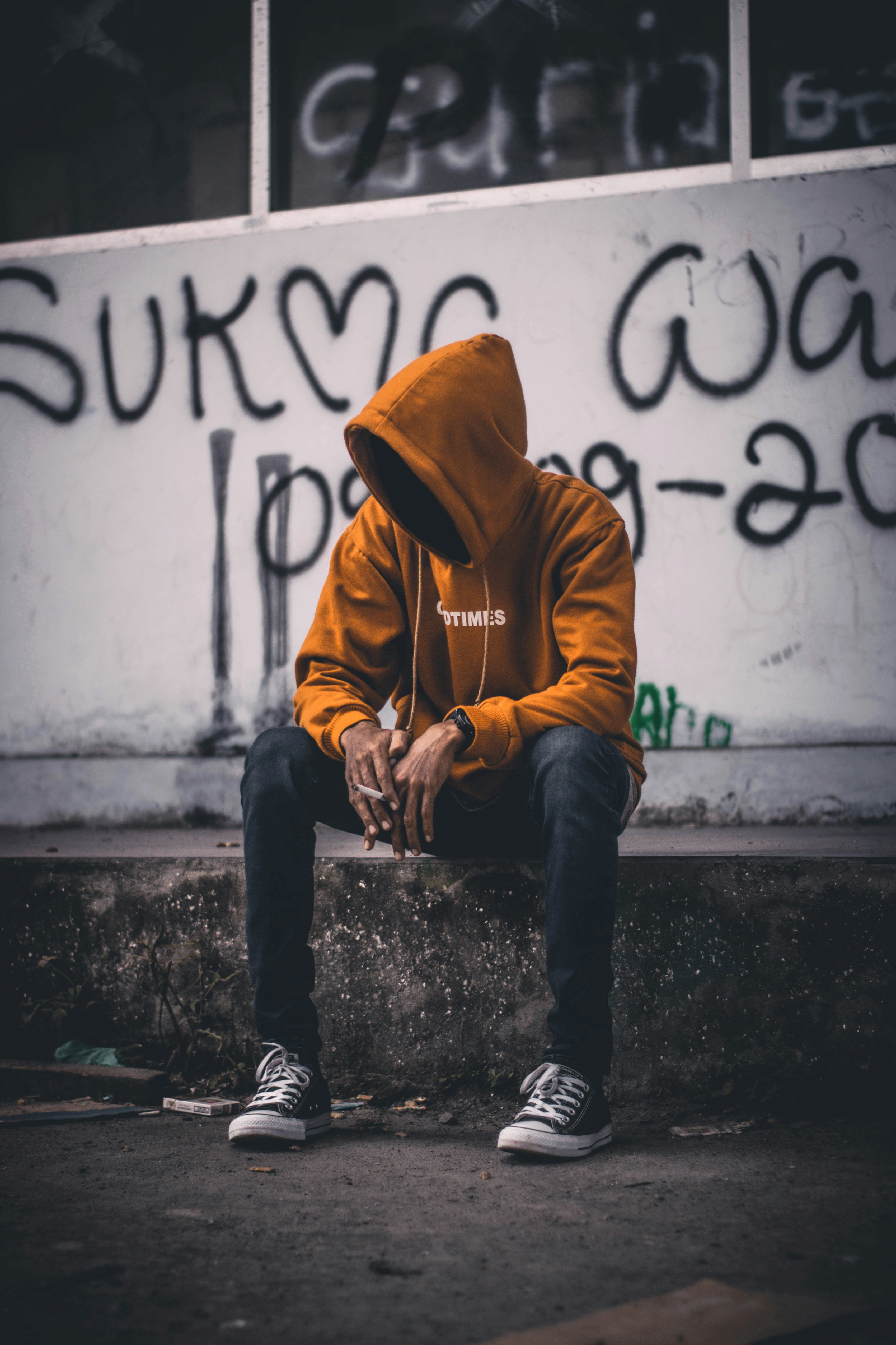 man sitting on ground