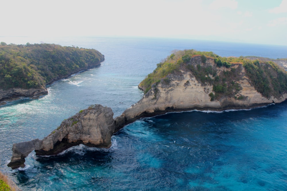 island near body of water during daytime