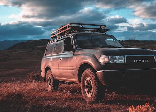 Toyota SUV parked on hill