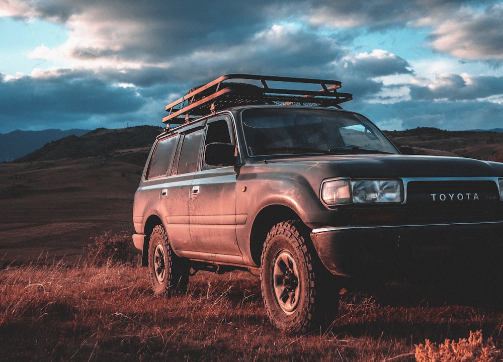 Toyota SUV parked on hill