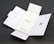 A Quick Start Guide titled 'Finger Tips' is placed in the center of an unfolded white cardboard package. The right side of the package has a cut-out opening, and the left side shows an illustration of a phone and a tool.