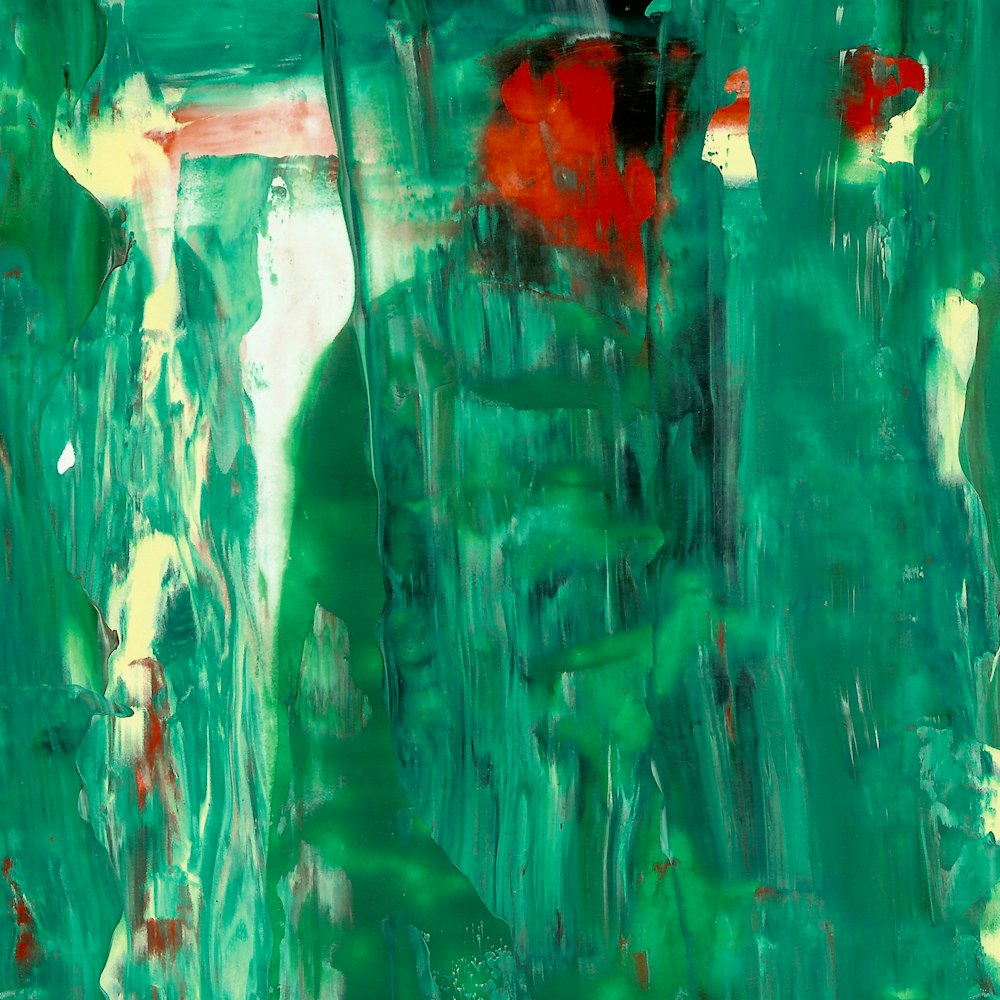 green and red abstract painting