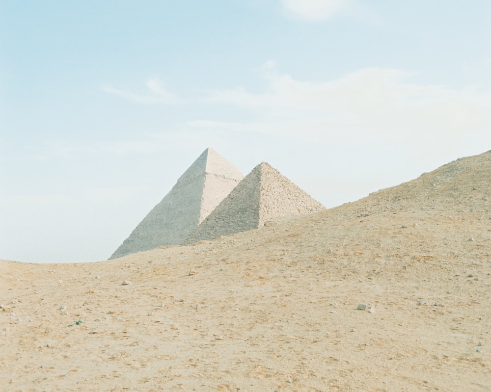 pyramids under blue sky