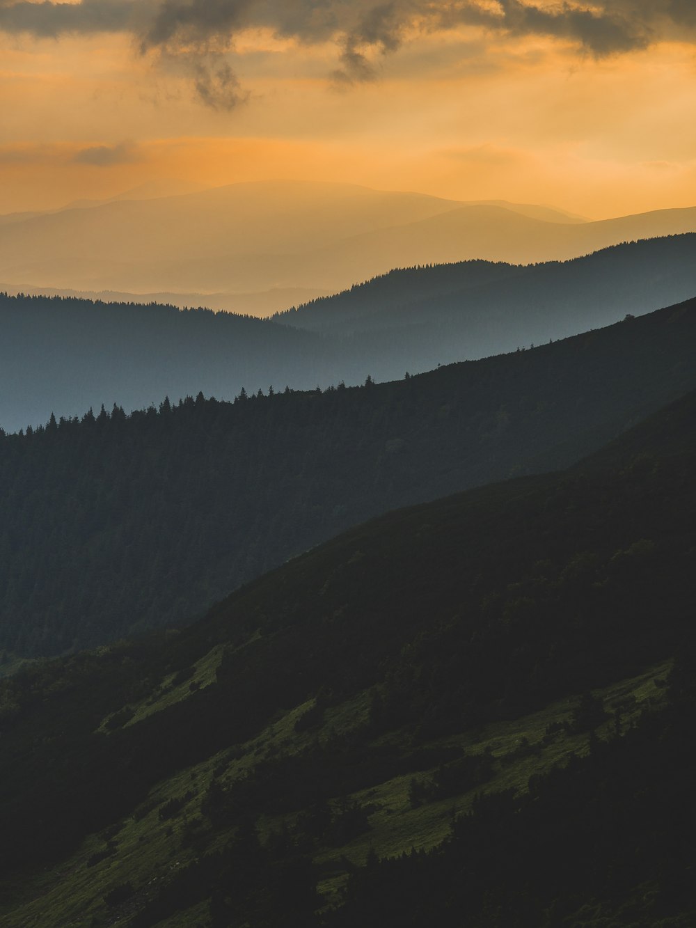 mountains under nimbus clouds