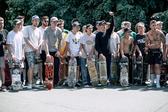people holding skateboards