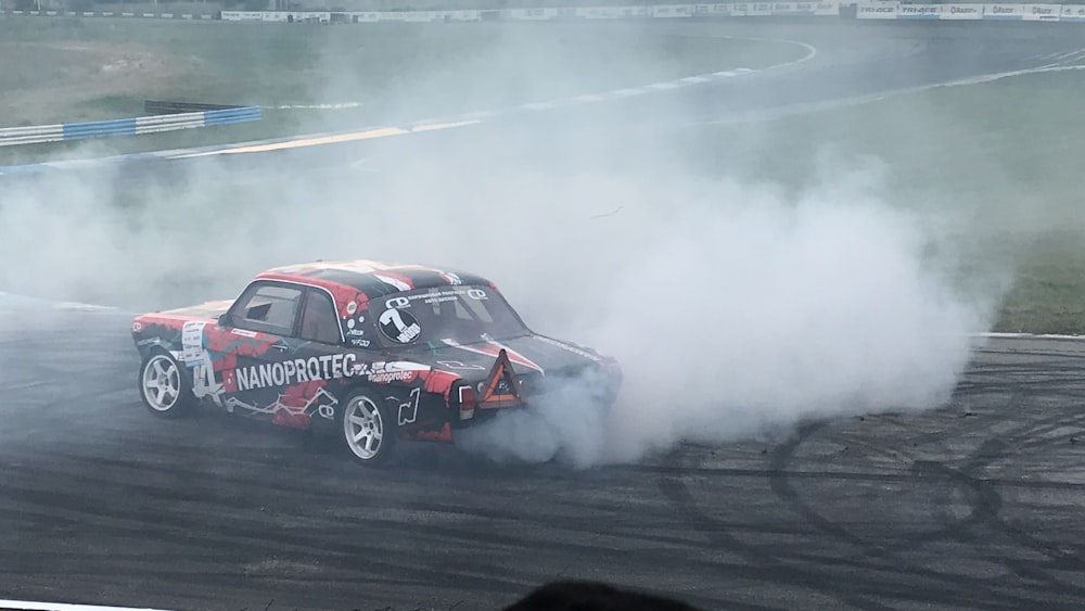 red and black coupe during daytime