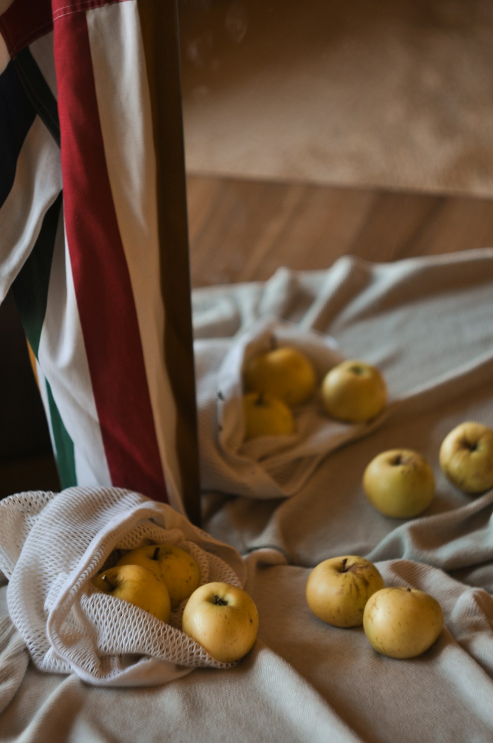 round yellow fruits on textile