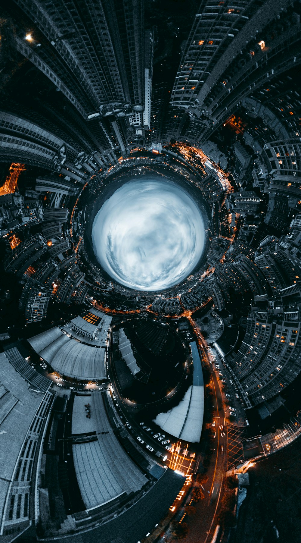 an aerial view of a city at night