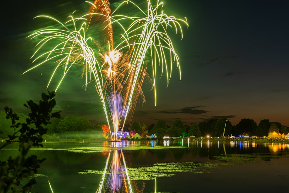 fireworks at body of water during nighttime