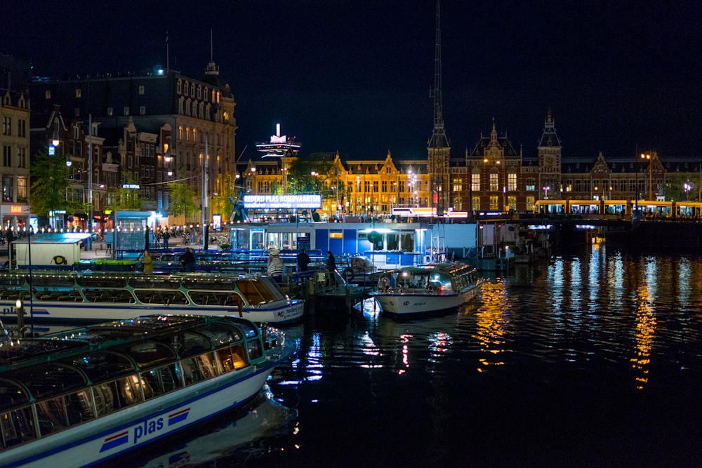 boats on body of water during nighttime