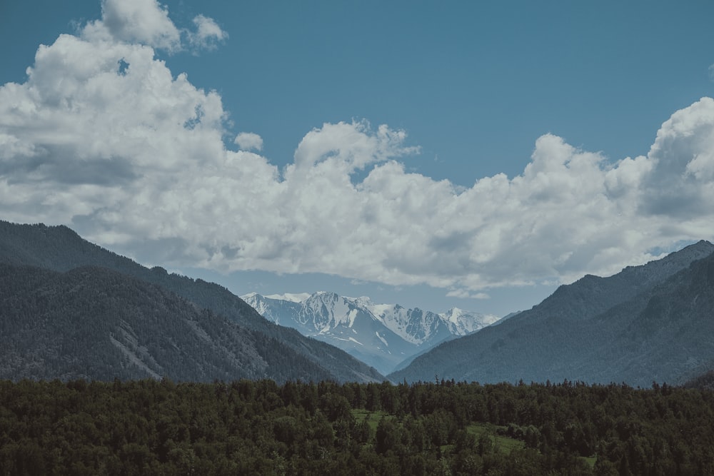 green mountains and clouds