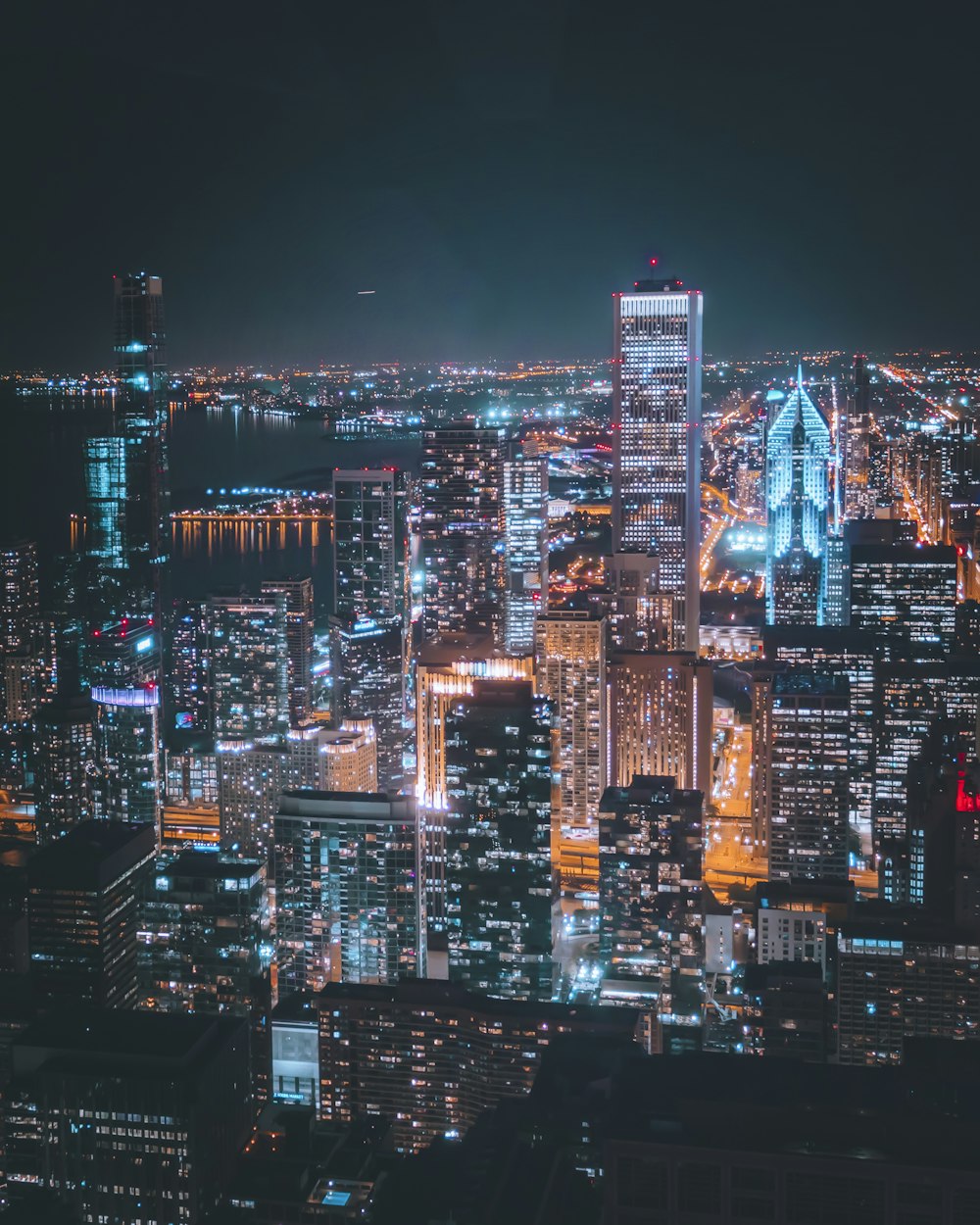 photo of high-rise buildings at night