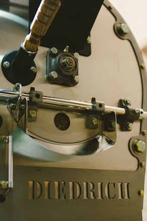 a close up of Pneumatic machine with a metal handle
