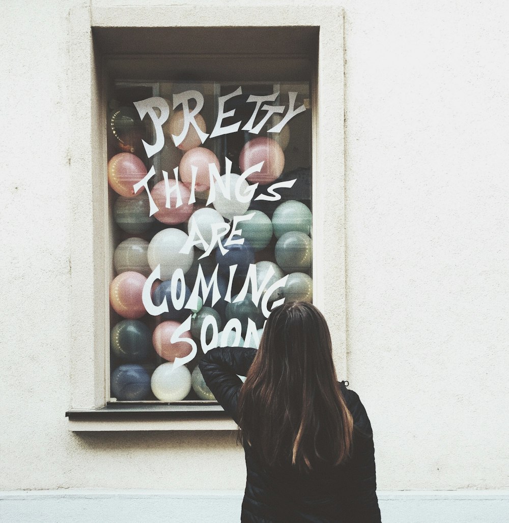 woman standing near wall