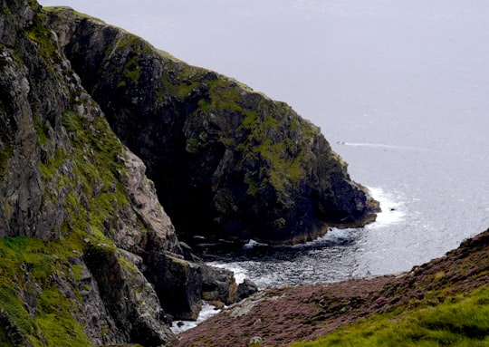 landscape photo of green and brown mountains in Slieve League Ireland