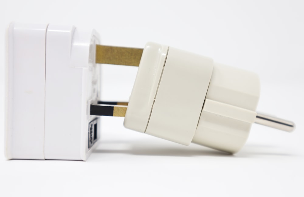 white adapter on white surface