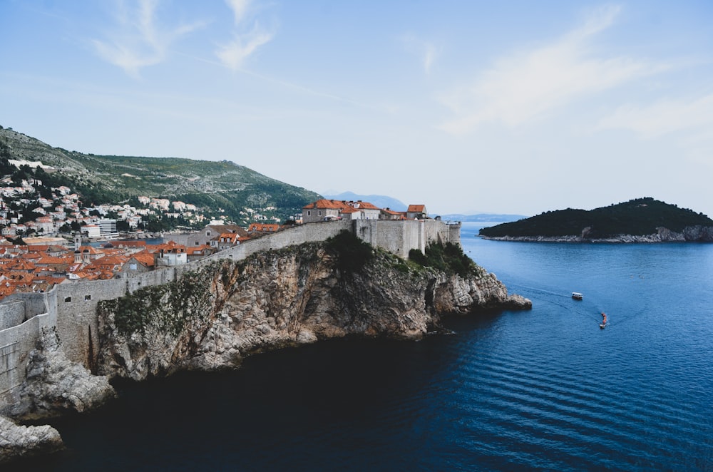 buildings near body of water during daytime