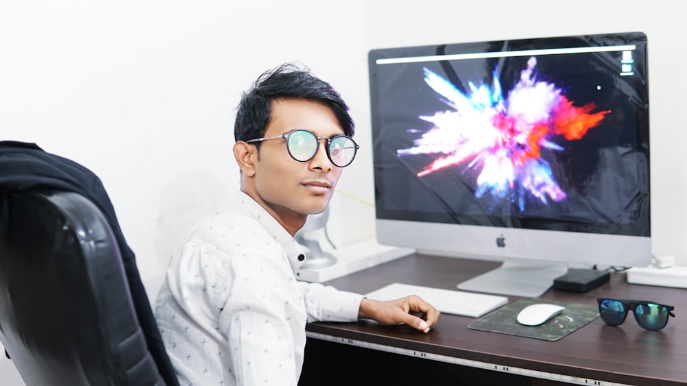 man using iMac