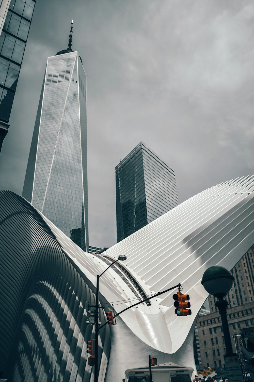 a very tall building towering over a city