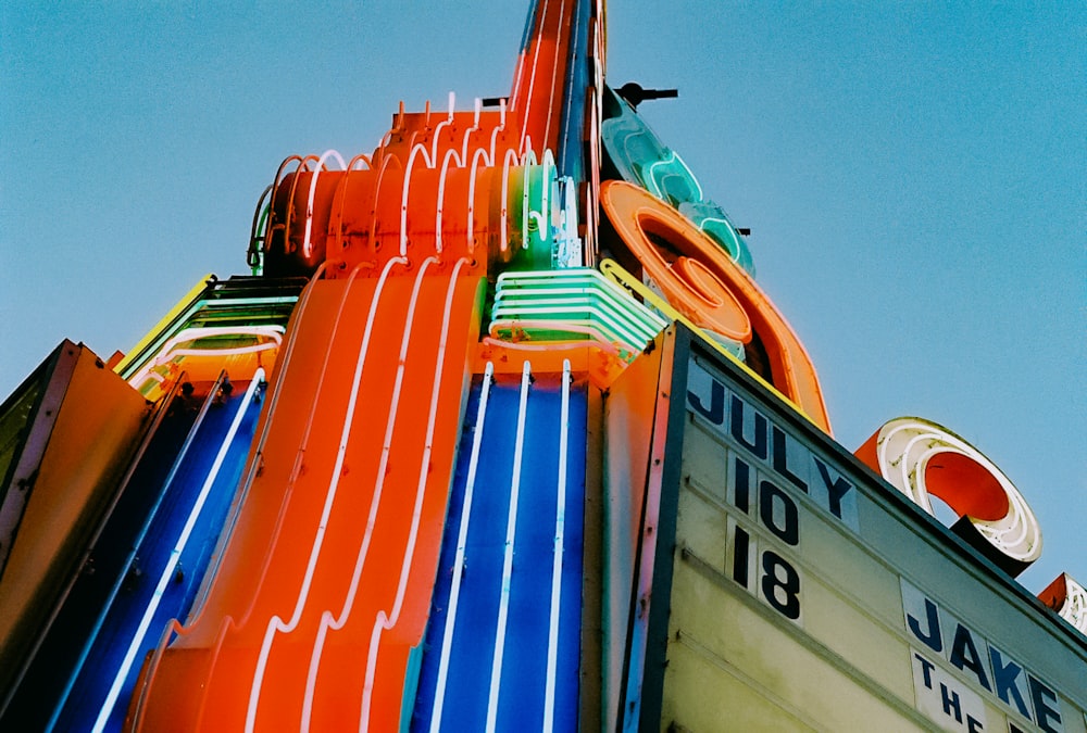 low-angle photography of turned-on neon lights of a building