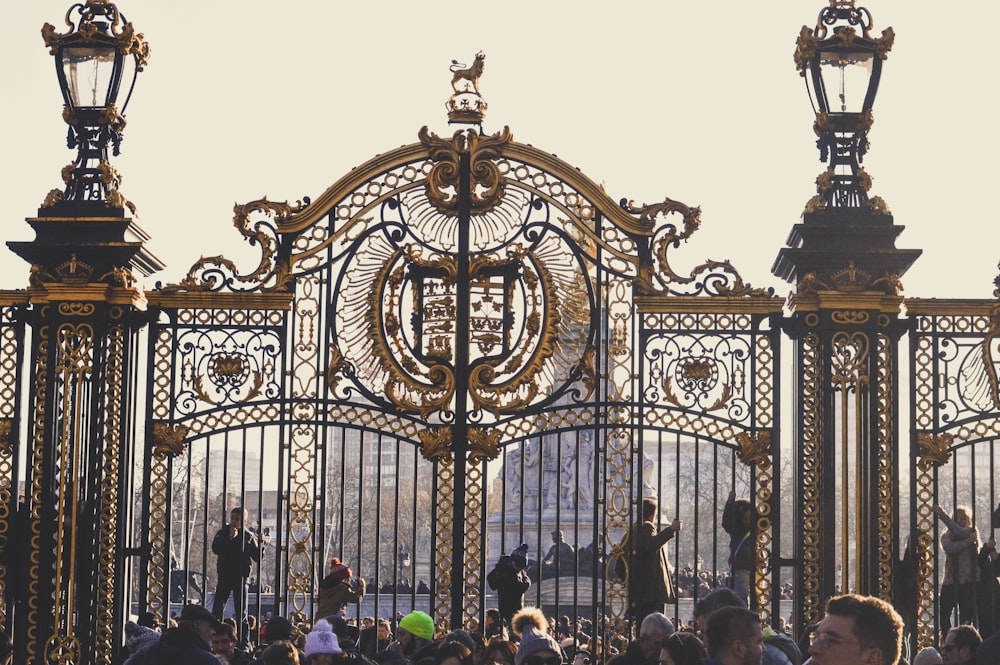 people standing in front of gate