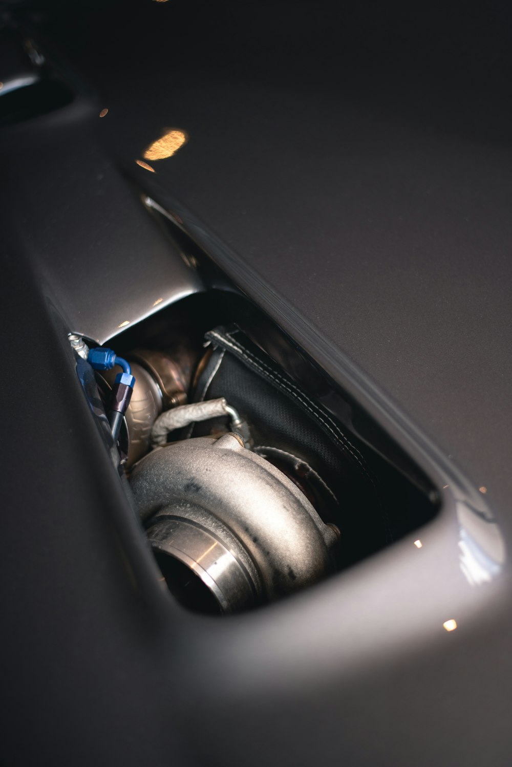 a close up of a car's exhaust system