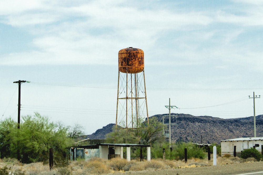 brown and white steel water tower