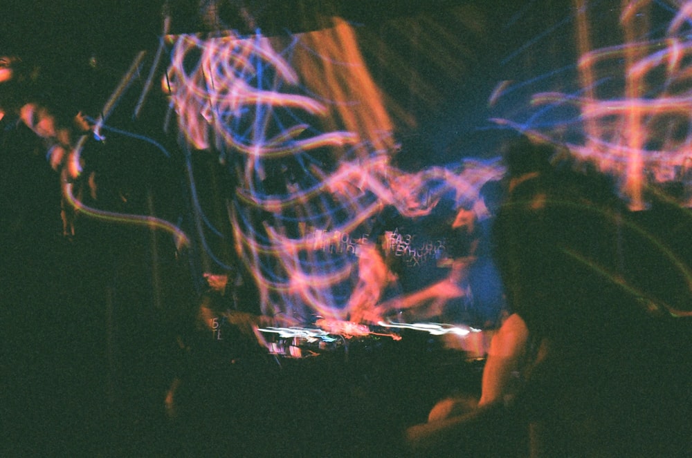a blurry photo of a person on a stage